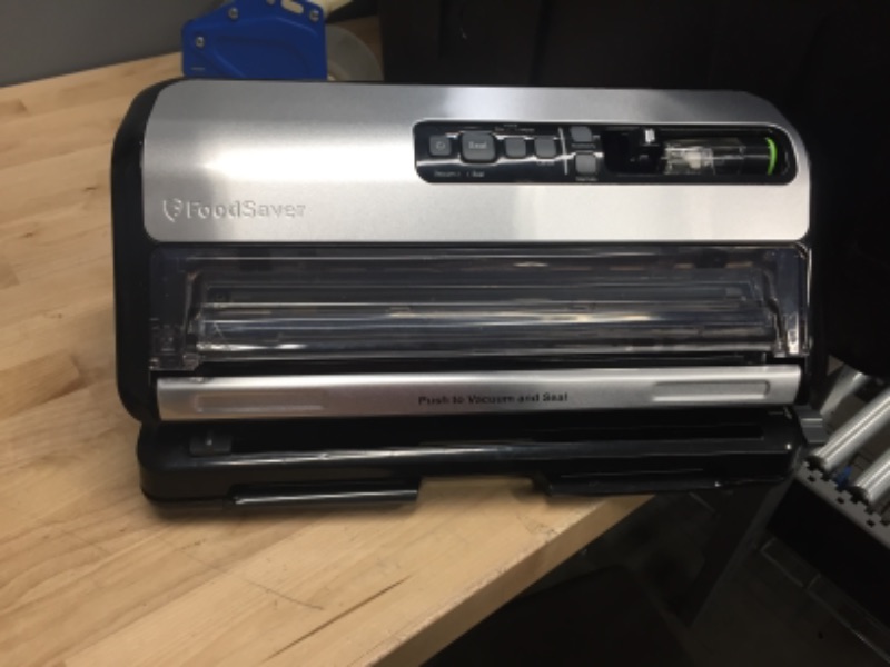 Photo 1 of 2-in-1 Black/Stainless Steel Vacuum Sealer System with Starter Kit