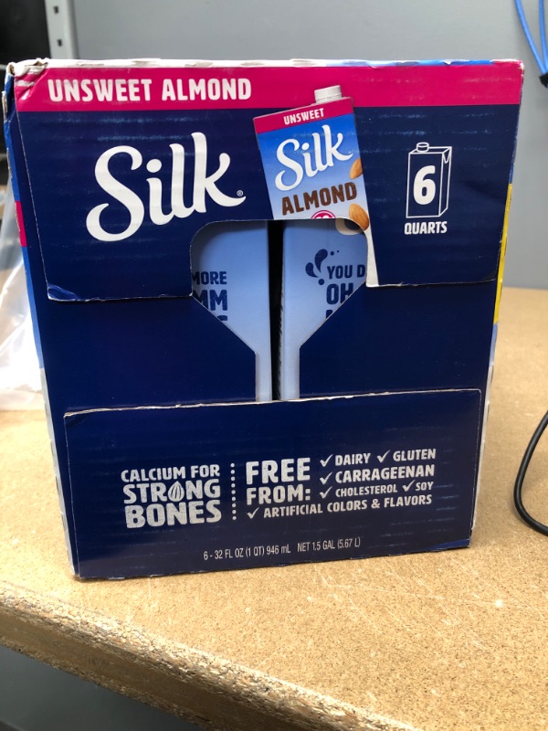 Photo 2 of **EXPIRES 9/02/2022** (Pack of 6) Silk Shelf-Stable Unsweetened Almond Milk, 1 Quart
