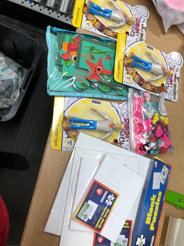 Photo 1 of ASSORTMENT OF TOYS AND GAMES/PUZZLES BUNDLE-**SOLD AS IS, NO RETURNS**
