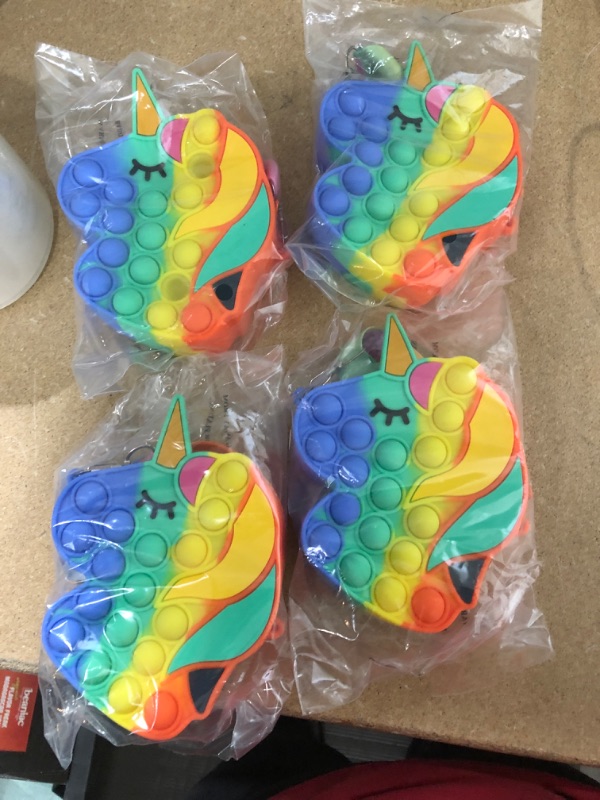 Photo 1 of Bubble Pop Purse Popper Fidget It Pack Toy, Rainbow Unicorn Figit Push Bag Poop Poppers Pops Its Figetget Popet Popitsfidgets Sensory Popit, Gifts for Kids Girl Teens
set of 4 **NOT REFUNDABLE**