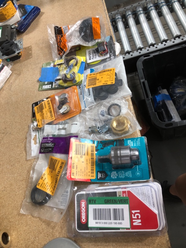 Photo 1 of **NO REFUNDS/RETURNS** - Bundle of Miscellaneous home depot goods (gasket, feed spool, hardware, etc. )