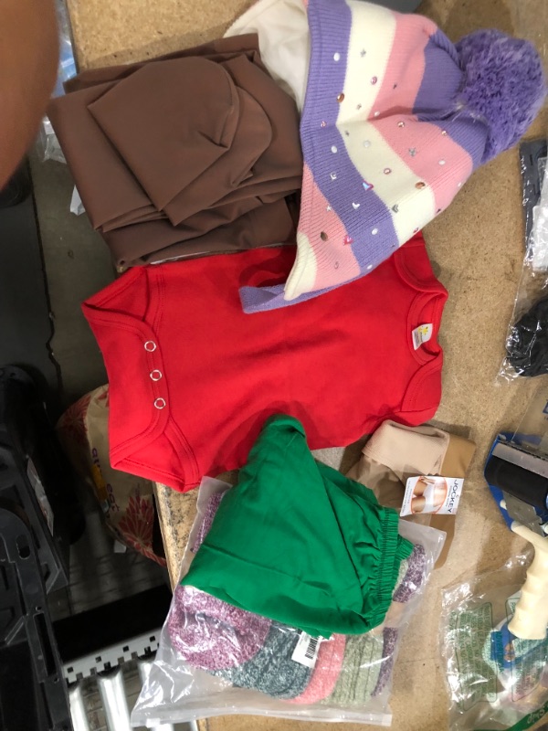 Photo 1 of **NO REFUNDS/RETURNS** - Bundle of assorted clothes for kids: socks, leggings, shirts