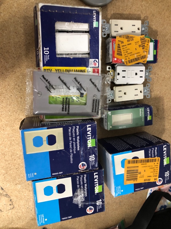 Photo 1 of **NO REFUNDS/RETURNS** - Bundle of assorted wallplates, switches, and outlets