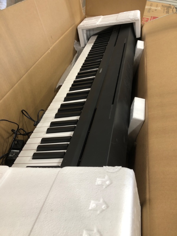 Photo 1 of Yamaha P71 88-Key Weighted Action Digital Piano with Sustain Pedal and Power Supply
