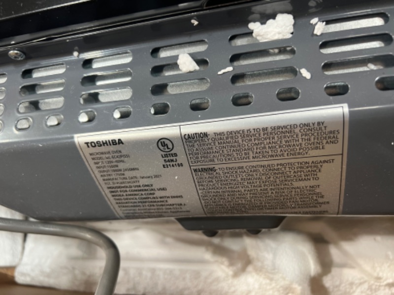 Photo 9 of Toshiba ML-EC42P(SS) Multifunctional Microwave Oven with Healthy Air Fry, Convection Cooking, Smart Sensor, Easy-to-Clean Interior and ECO Mode, 1.5 Cu.ft, Black Stainless Steel
**** dented in the front***