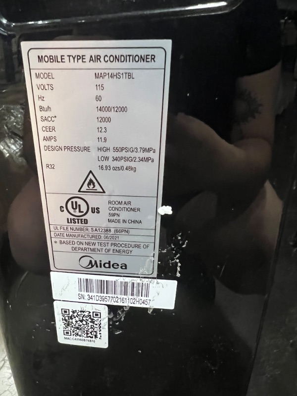 Photo 1 of Midea Duo 12,000 BTU (10,000 BTU SACC) HE Inverter Ultra Quiet Portable Air Conditioner, Cools up to 450 Sq. Ft., Smart Wi-Fi, Works with Alexa/Google Assistant, Includes Remote Control & Window Kit
