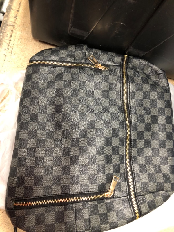 Photo 3 of grey and black checkered backpack purse