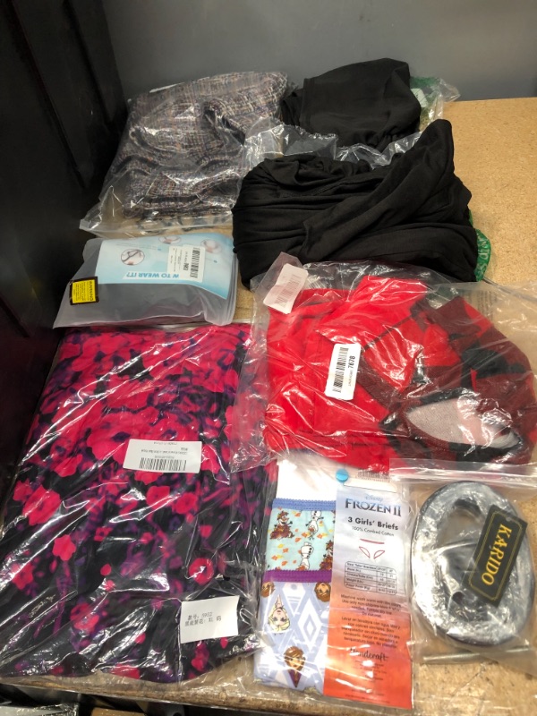 Photo 1 of CLOTHING ITEMS AND ACCESSORIES  BUNDLE NON REFUNDABLE
varying sizes and styles 