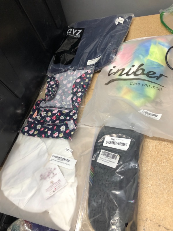 Photo 1 of CLOTHING ITEM BUNDLE NON REFUNDABLE
varying sizes and styles 
