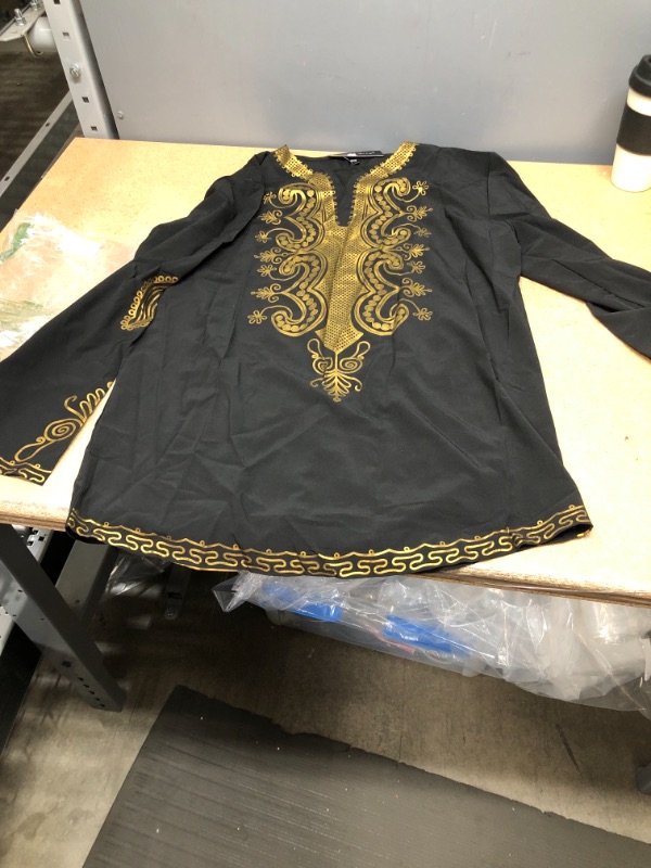 Photo 2 of BLACK AND GOLD PRINTED SHIRT
WOMENS SIZE XXL