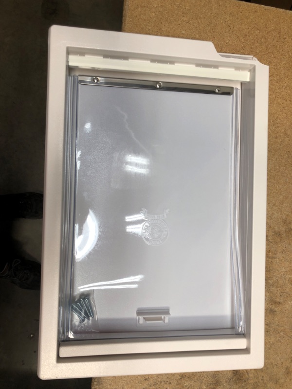 Photo 2 of (BROKEN OFF CORNER/CRACKED CORNER)
Ideal Pet Products Thermoplastic Dog Door, X-Large, 18.62"L X 2.12"W X 12.44"H
