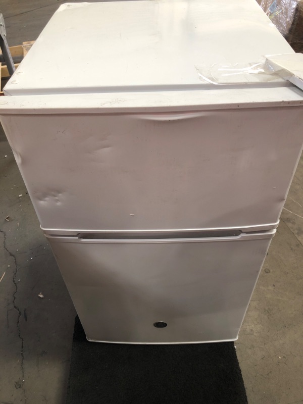 Photo 3 of **DAMAGED** GE 3.1 Cu Ft Double-Door Compact Refrigerator GDE03GGKWW, White