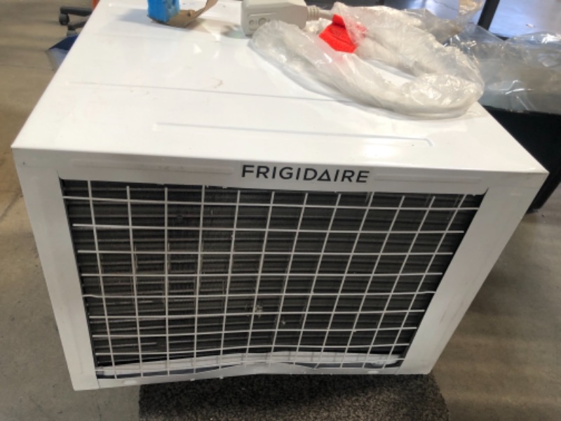 Photo 7 of *AC UNIT NEEDS ADAPTER TO FIT INTO POWER OUTLET*
Frigidaire Window Room Air Conditioner, 18,500 BTU with Supplemental Heat and Slide Out Chassis, in White
