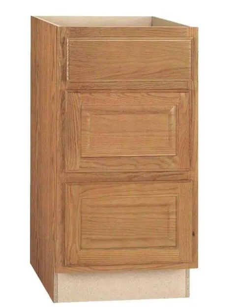 Photo 1 of  Hampton Bay Hampton Medium Oak Raised Panel Assembled Drawer Base Kitchen Cabinet with Drawer Glides (18 in. x 34.5 in. x 24 in.)