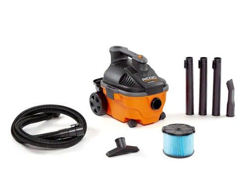 Photo 1 of 4 Gallon 5.0-Peak HP Portable Wet/Dry Shop Vacuum with Fine Dust Filter, Hose and Accessories
