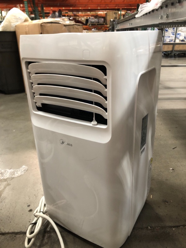 Photo 5 of DAMAGED Midea 8,000 BTU DOE (5,300 BTU SACC) Portable Air Conditioner, Cools up to 175 Sq. Ft., Works as Dehumidifier & Fan, Remote Control & Window Kit Included
