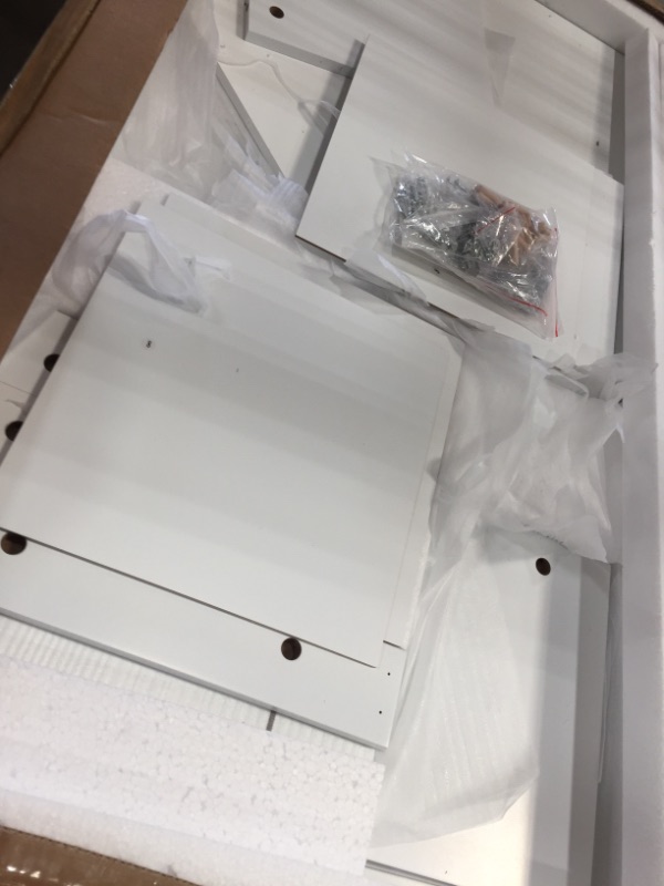 Photo 1 of **INCOMPLETE BOX 1 OF 2**
RiverRidge 02-144 Corner Cabinet, White
