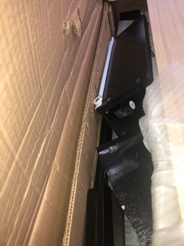 Photo 1 of *Damage shown in picture**Loose Hardware*
Dream on Me Jayden 4-in-1 Mini Convertible Crib & Changer, Black