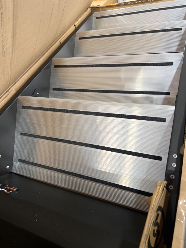 Photo 1 of Lippert 791575 SolidStep Fold-Down RV Premium Quad Steps - 29-36" Width