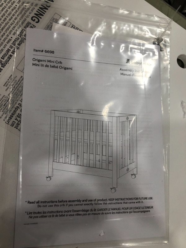 Photo 3 of Babyletto Origami Mini Crib in White & Pure Core Non-Toxic Mini Crib Mattress with Hybrid Waterproof Cover Bundle
- Missing//loose hardware 