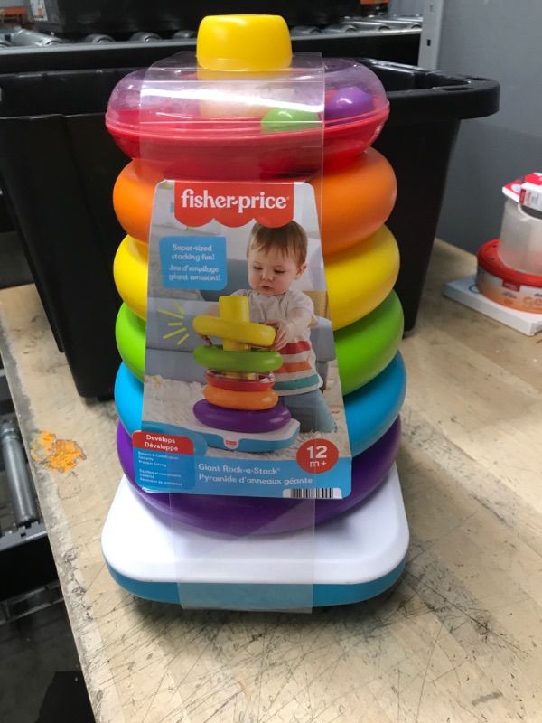 Photo 2 of Fisher-Price Giant Rock-a-Stack, 14-inch Tall Stacking Toy with 6 Colorful Rings for Baby to Grasp, Shake, and Stack