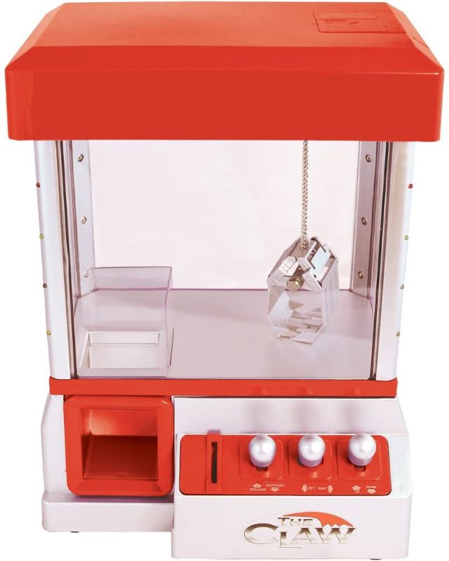 Photo 1 of Carnival Crane Claw Game - Features Animation and Sounds for Exciting Pretend Play - Ages 8+
