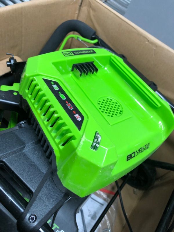 Photo 2 of **MISSING BATTERY AND HANDLE** 
Greenworks Pro 80V 20 inch Snow Thrower with 2Ah Battery and Charger
