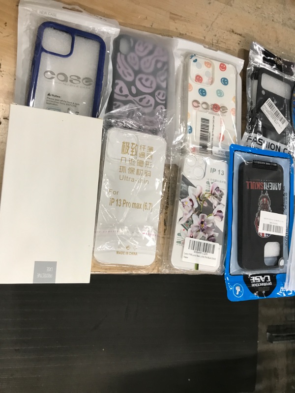 Photo 1 of MISCELLANEOUS BUNDLE OF ASSORTED PHONE CASES AND OTHER ELECTRICAL GOODS