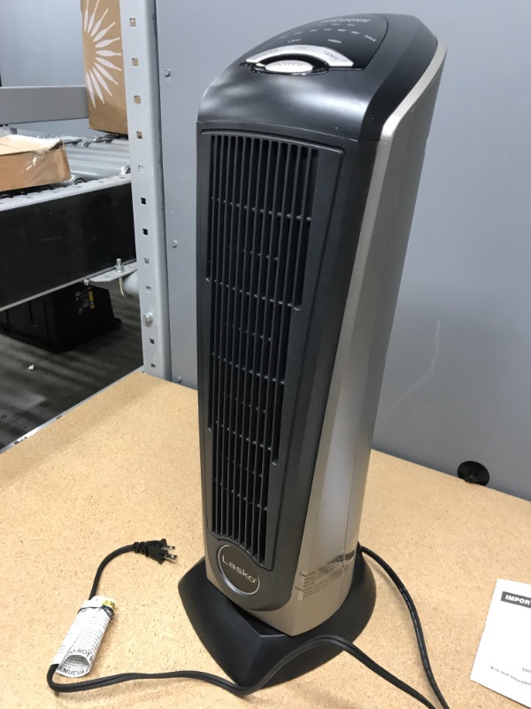 Photo 3 of USED Lasko Lasko-22 Digital Ceramic Oscillating Remote (751320) Tower Heater, 8.5x2033 L x 7.25x2033 W x 23x2033 H, Grey/Black
