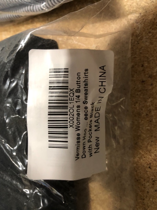 Photo 1 of NON-REFUNDABLE BAG OF ASSORTED CLOTHES;
includes;  large legging, XL thanksgiving shirt, XL sweater and XL purple shirt 