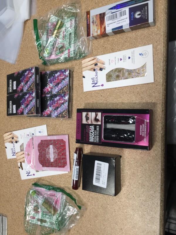 Photo 1 of NON-REFUNDABLE BAG OF ASSORTED MAKE UP AND NAIL ART 