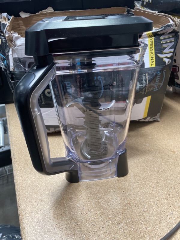 Photo 2 of **INCOMPLETE**Ninja BL610 Professional 72 Oz Countertop Blender with 1000-Watt Base and Total Crushing Technology for Smoothies, Ice and Frozen Fruit, Black, 9.5 in L x 7.5 in W x 17 in H**MISSING MAIN COMPONENT*BLENDING CONTAINER, BLADE AND LID ONLY**
