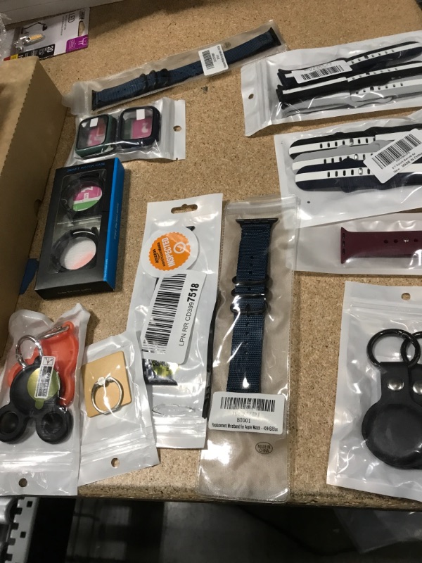 Photo 3 of NON-REFUNDABLE BAG OF ASSORTED PHONE ACCESSORIES*
including; watch band, air tag case, and more 