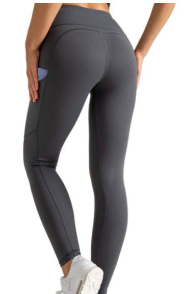 Photo 1 of CJOY Women Yoga Leggings with Pockets High Waist Workout Leggings Tummy Control Stretch Leggings Yoga Pants, Large 
