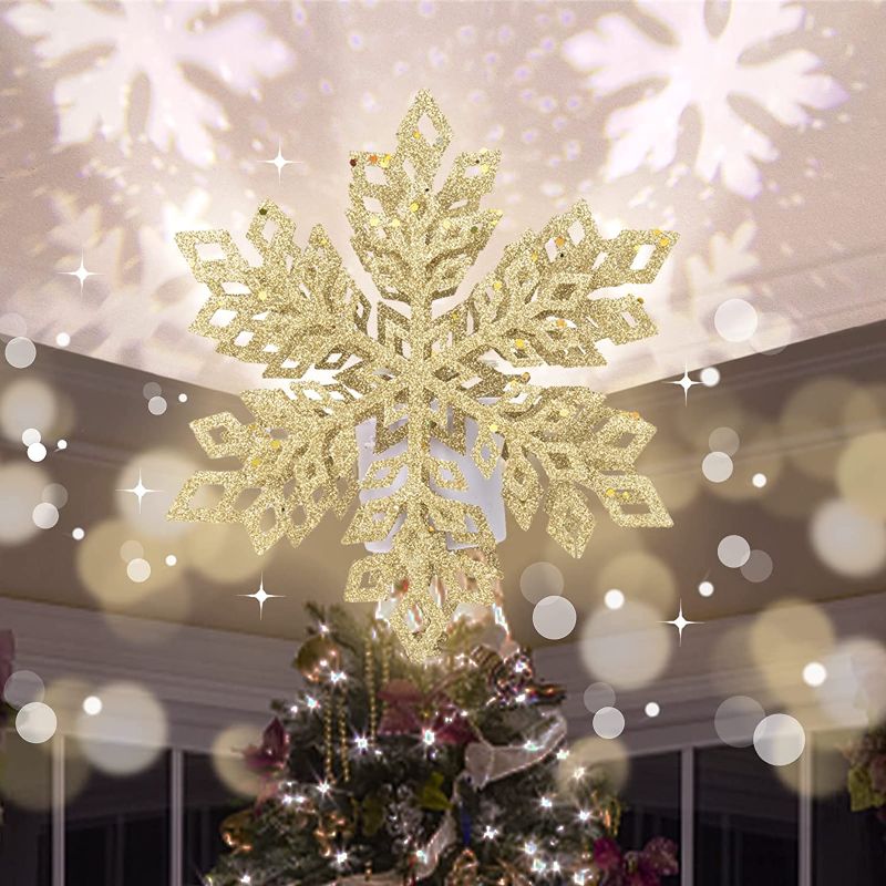 Photo 1 of MUMTOP Christmas Tree Topper Lighted Snowflake Tree Topper with Rotating Snowflake LED Projector, 3D Glitter Snowflake Tree Light for Christmas Tree Decorations (Gold)