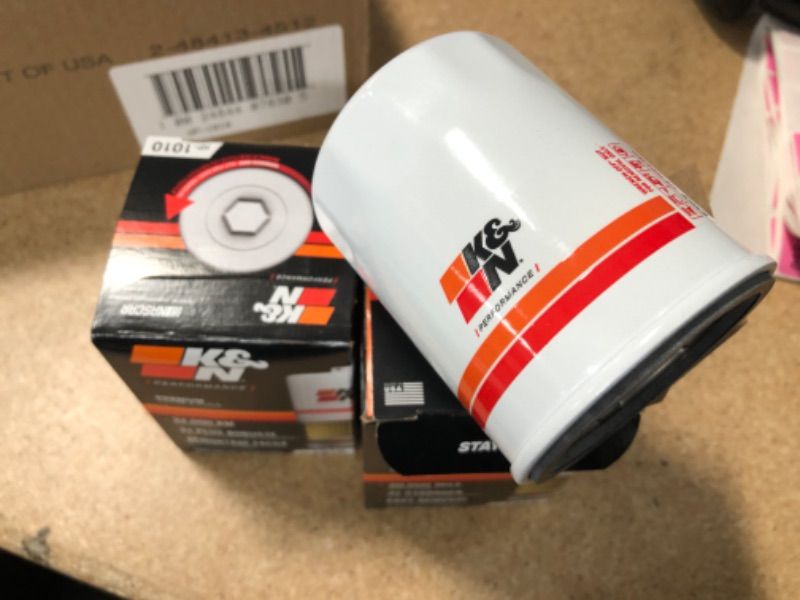 Photo 1 of PACK OF TWO- K&N Premium Oil Filter: Protects your Engine: Compatible with Select ACURA/HONDA/MITSUBISHI/NISSAN Vehicle Models (See Product Description for Full List of Compatible Vehicles), HP-1010