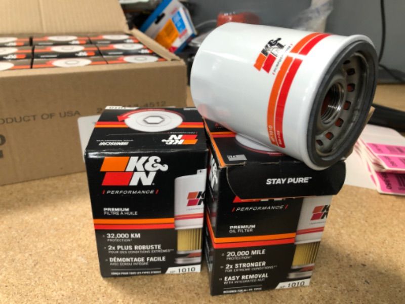 Photo 1 of PACK OF TWO- K&N Premium Oil Filter: Protects your Engine: Compatible with Select ACURA/HONDA/MITSUBISHI/NISSAN Vehicle Models (See Product Description for Full List of Compatible Vehicles), HP-1010