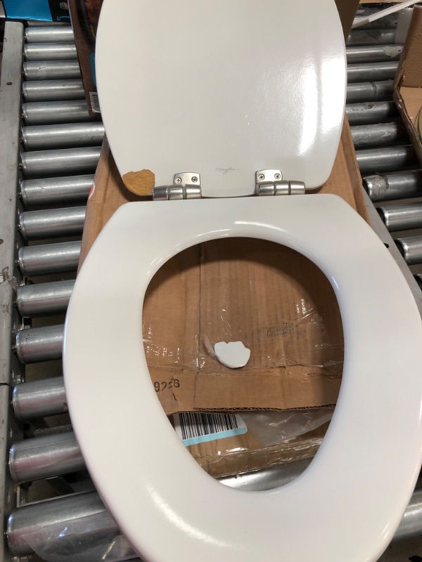 Photo 2 of **DAMAGE TO SEAT** Mayfair Slow Close Elongated White Molded Wood Toilet Seat
