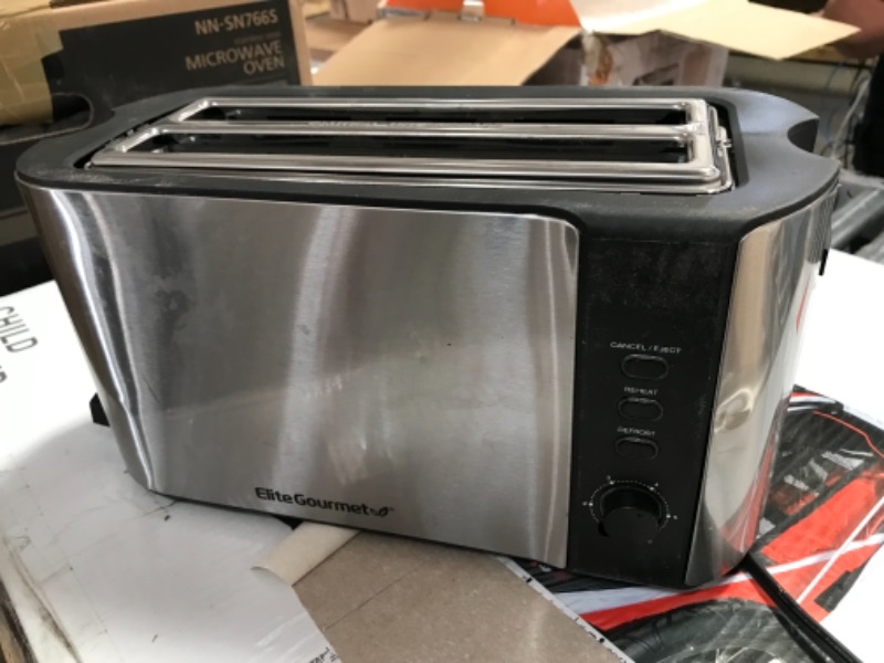 Photo 7 of Elite Gourmet ECT-3100## Long Slot Toaster, Reheat, 6 Toast Settings, Defrost, Cancel Functions, Slide Out Crumb Tray, Extra Wide Slots for Bagels Waffles, 4 Slice, Stainless Steel & Black
