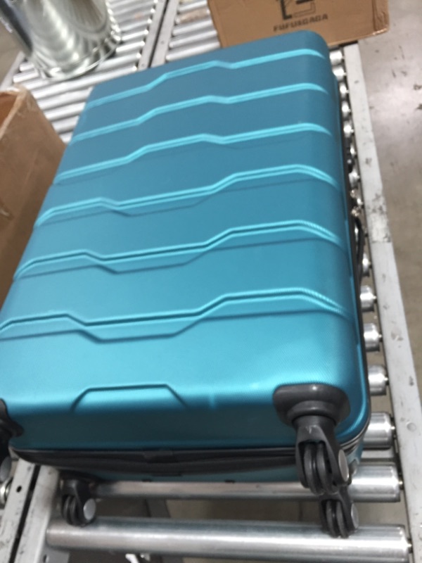 Photo 2 of Elite Luggage
Omni 3-Piece Teal Hardside Spinner Luggage Set ***USED*** MINOR WEAR AND TEAR***