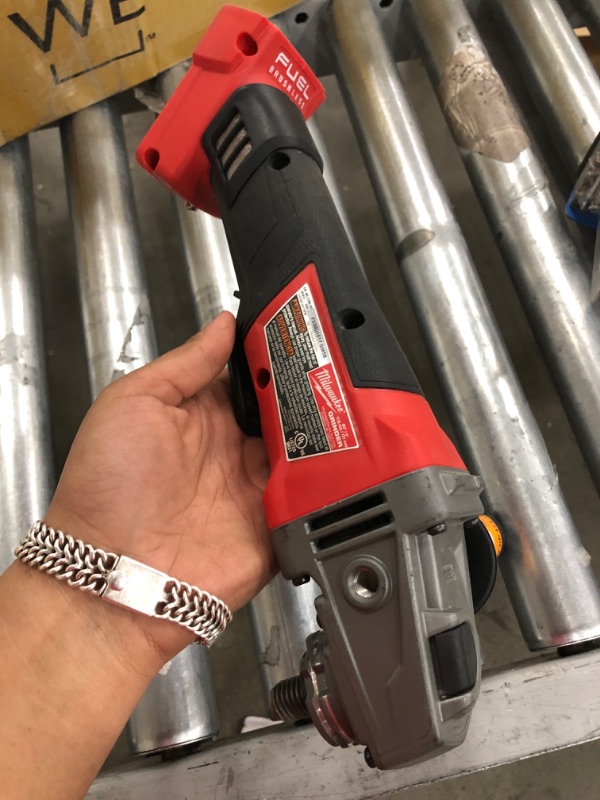 Photo 4 of PARTS ONLY
Milwaukee\ M18 FUEL 18-Volt Lithium-Ion Brushless Cordless 4-1/2 in./5 in. Grinder w/Paddle Switch (Tool-Only)