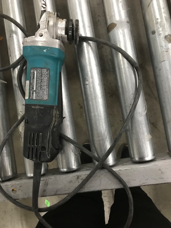 Photo 3 of Makita 9557PB 4-1/2" Paddle Switch Angle Grinder, with AC/DC Switch
