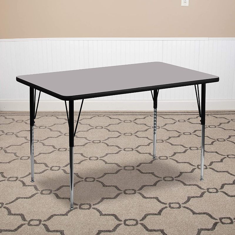 Photo 1 of **MINOR DAMAGE*MISSING LEGS**  Flash Furniture 30''W x 72''L Rectangular Grey Thermal Laminate Activity Table - Standard Height Adjustable Legs
