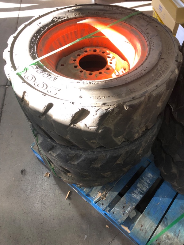 Photo 1 of ***USED SET OF 6 TIRES AND WHEELS* READ BELOW* Titan HD2000 Skid Steer Industrial Tire - 27x10.50-15 D/8-Ply
