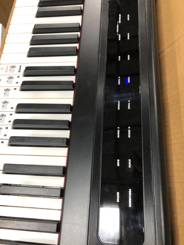 Photo 3 of RockJam 88-Key Beginner Digital Piano with Full-Size Semi-Weighted Keys, Power Supply, Simply Piano App Content & Key Note Stickers, Black
