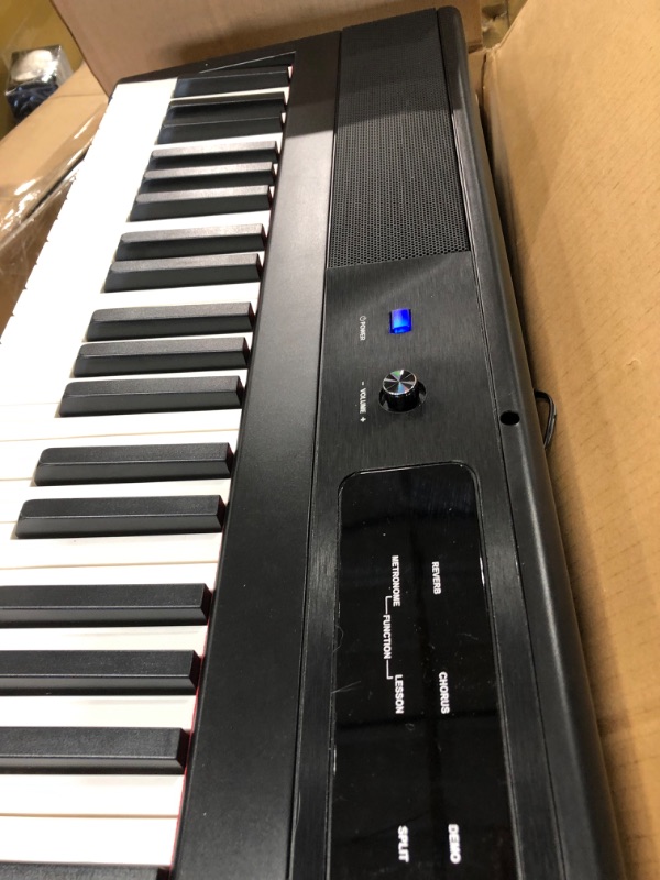 Photo 6 of RockJam 88-Key Beginner Digital Piano with Full-Size Semi-Weighted Keys, Power Supply, Simply Piano App Content & Key Note Stickers, Black
