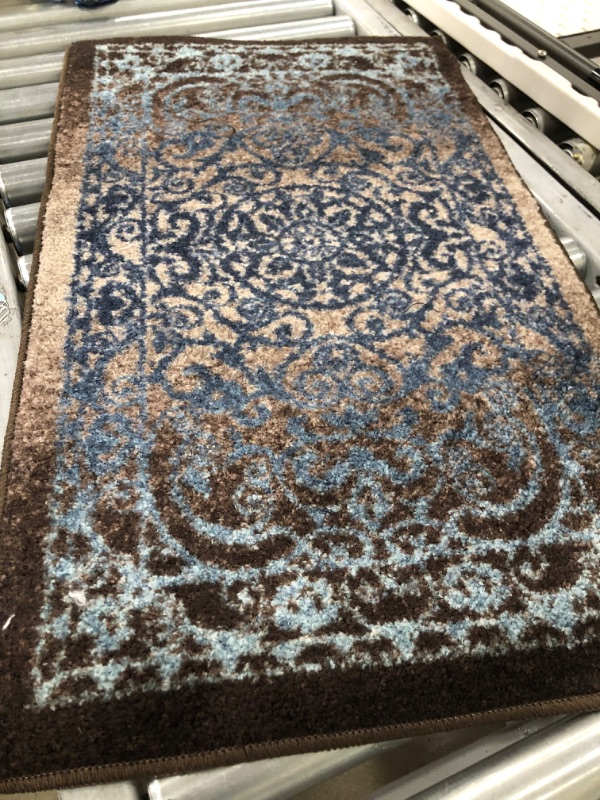 Photo 1 of 1'8''X2'10'' BROWN AND BLUE RUG