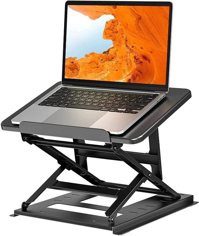 Photo 1 of HUANUO Adjustable Laptop Stand for Desk, Adjustable Height Laptop Riser - Easy to Sit or Stand with 9 Adjustable Angles, Portable Computer Stand Reduces...
