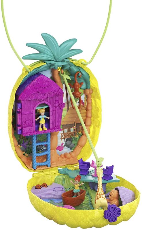 Photo 1 of Polly Pocket Tropicool Pineapple Wearable Purse Compact with 8 Fun Features, Micro Polly and Lila Dolls, 2 Accessories and Sticker Sheet; for Ages 4 and Up
