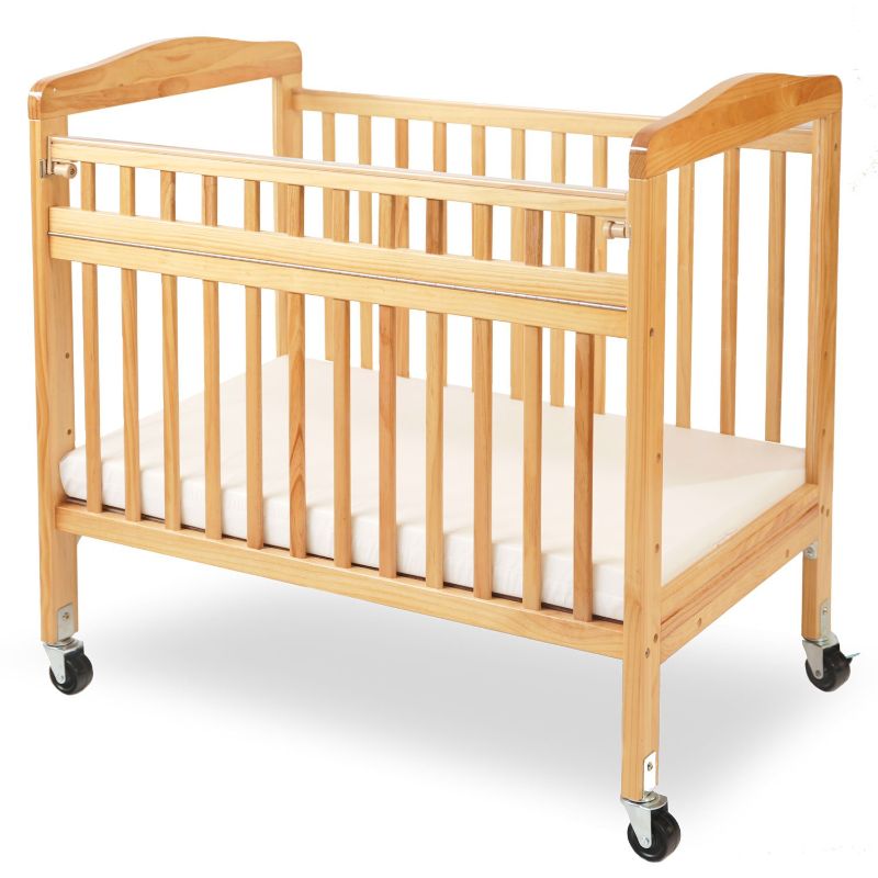 Photo 1 of LA Baby Compact Non-Folding Wooden Window Crib with Safety Gate, Natural
